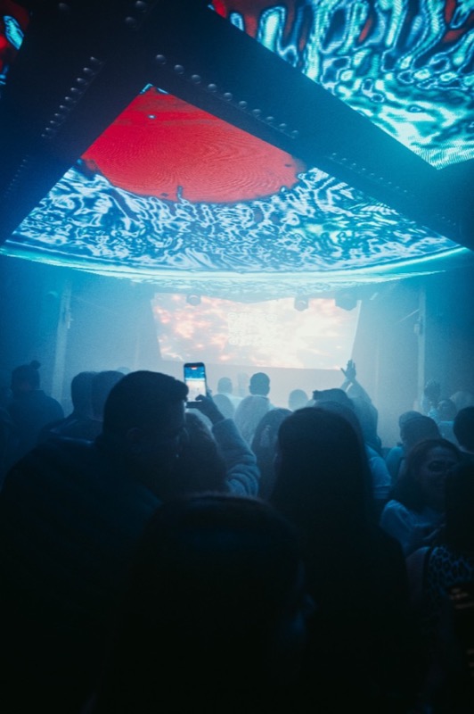 RadioJavan resident DJ Cincinati mixing at a London club — Persian music night